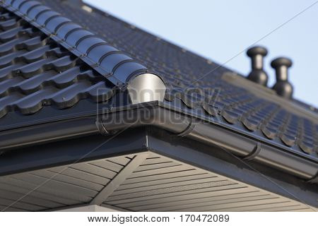 Corner of the house with gutter.