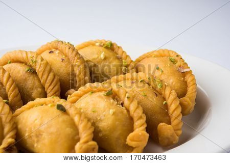 Gujiya - sweet dumplings made during the festival of holi and diwali, selective focus