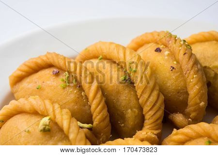 Gujiya - sweet dumplings made during the festival of holi and diwali, selective focus