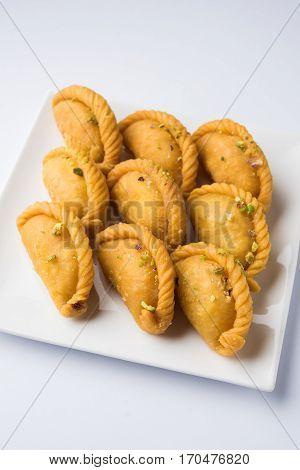 Gujiya - sweet dumplings made during the festival of holi and diwali, selective focus