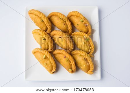 Gujiya - sweet dumplings made during the festival of holi and diwali, selective focus