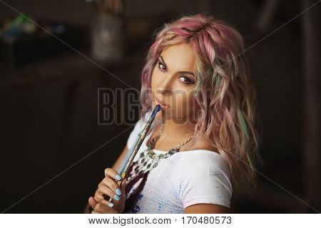 Portrait of the artist with multi-colored hair