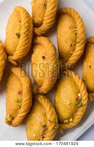 Gujiya - sweet dumplings made during the festival of holi and diwali, selective focus