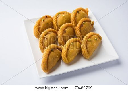 Gujiya - sweet dumplings made during the festival of holi and diwali, selective focus