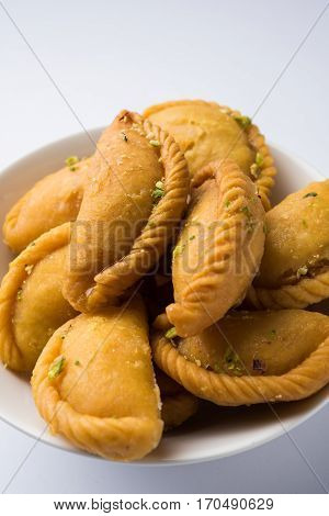 Gujiya - sweet dumplings made during the festival of holi and diwali, selective focus