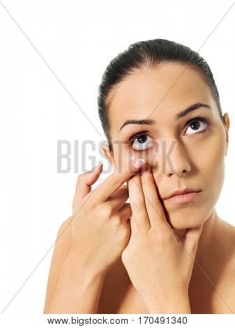 Young woman wearing contact lens