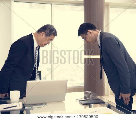 Business Partners Introductionary Handshake Bow