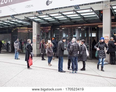 BERLIN GERMANY - FEBRUARY 11 2017: Cinemagoers In Front of The Berlin International Film Festival Berlinale Cinema At Potsdamer Platz Berlin