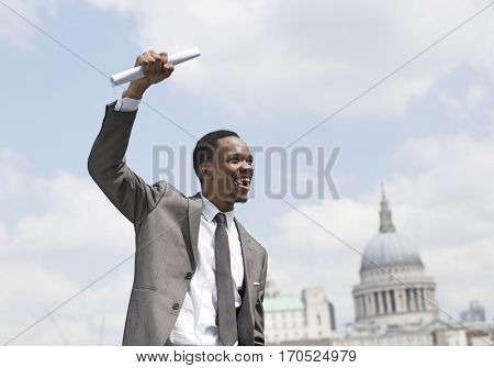 Portrait of Afircan American businessman celebrating