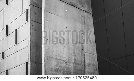Concrete Building facade with lines and vertical features