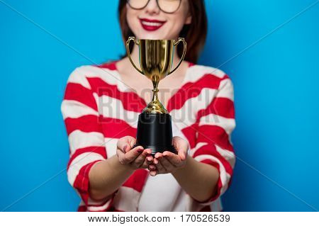 Young Smiling Woman With Cup Trophy