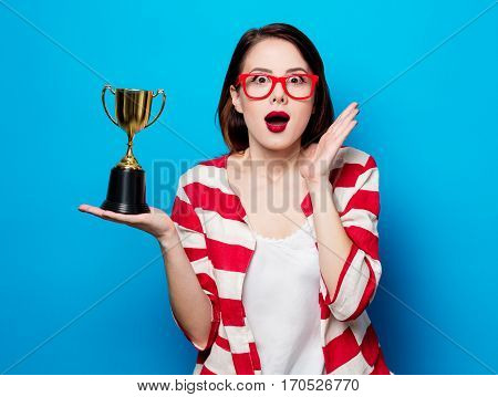 Young Surprised Woman With Cup Trophy