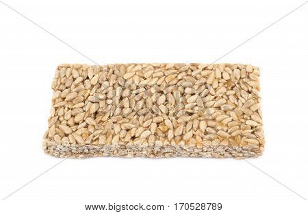 Single piece of a gozinaki confection sweets isolated over the white background