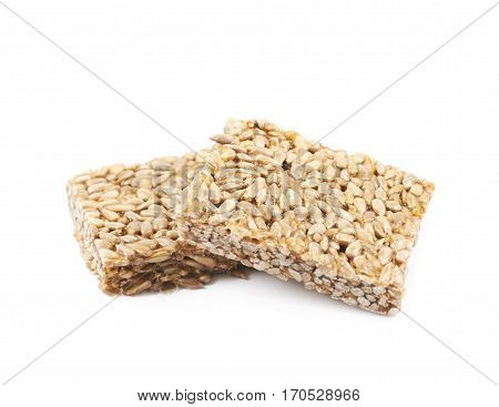 Two pieces of gozinaki confection sweets isolated over the white background