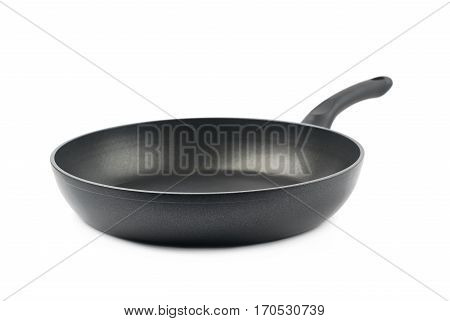 Metal black frying pan with a non-stick coating, composition isolated over the white background