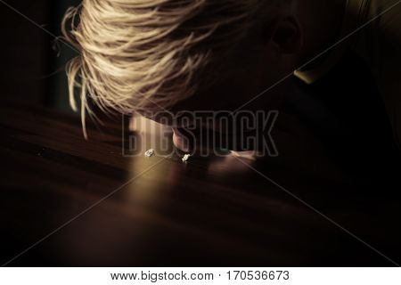 Teenage Boy Snorting Cocaine Off A Table