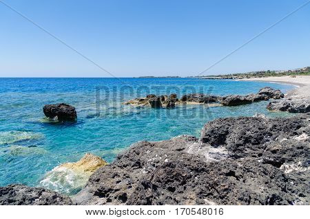 Rocky coastline with turquoise lagoon near Paleochora town on Crete island, Greece