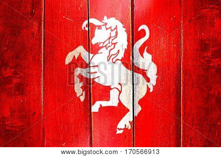 Vintage Twente flag on grunge wooden panel