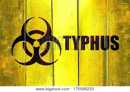 Vintage Typhus on a grunge wooden panel