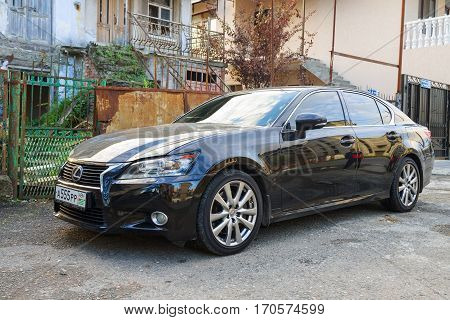 Sukhum, Russia - October 10, 2016: New Lexus ES luxury sedan parked in the street.