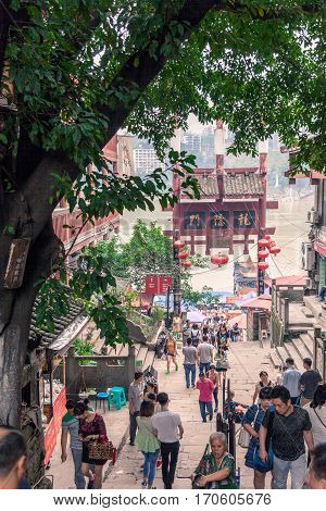 Chongqing China September 15 2015 : Unidentified tourists are walk for shopping in Ciqikou city of ancient and historical shophouses