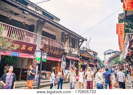 Chongqing China September 15 2015 : Unidentified tourists are walk for shopping in Ciqikou city of ancient and historical shophouses