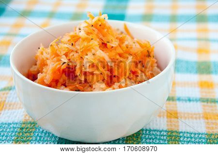 Carrot Salad And Loby In A White Plate On The Table