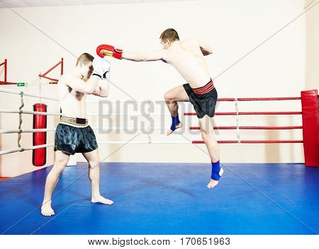 Muay thai fighters at boxing ring