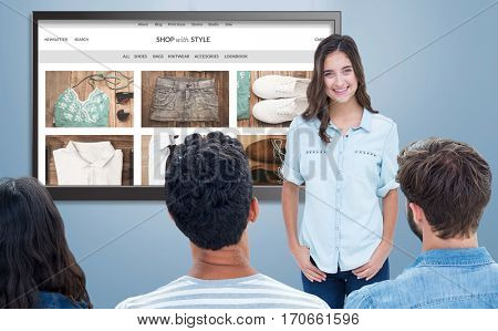 Casual young businessman giving presentation to colleagues against website frontpage