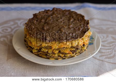 Pie Beef Liver With Onions And Tuschenym Markovka On A Plate Decorated With Mayonnaise. Liver Cake.
