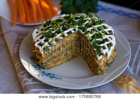 Pie Beef Liver With Onions And Tuschenym Markovka On A Plate Decorated With Mayonnaise. Liver Cake.