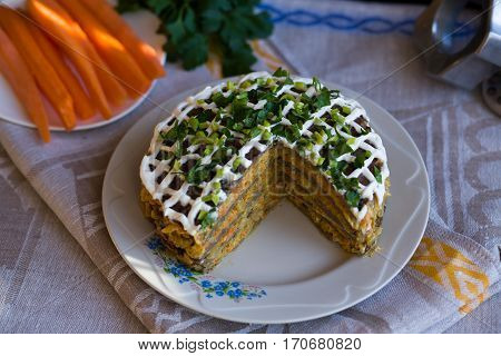 Pie Beef Liver With Onions And Tuschenym Markovka On A Plate Decorated With Mayonnaise. Liver Cake.