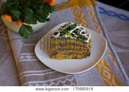 Pie Beef Liver With Onions And Tuschenym Markovka On A Plate Decorated With Mayonnaise. Liver Cake.
