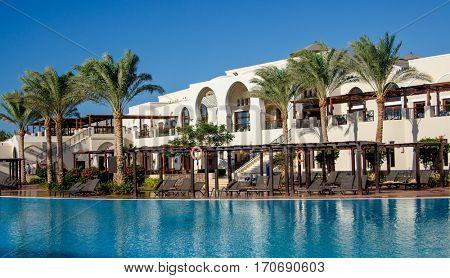EGYPT, SHARM EL SHEIKH - JULY 19, 2015: Buildings and Area Hotel Jaz Belvedere in Sharm El Sheikh, Popular Center of a Beach Holiday and Diving, Red Sea, Summer, Egypt