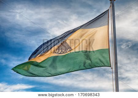In The Cloudy Sky Waving Flag