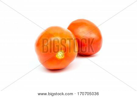 The fresh tomatoes on white background (isolated)