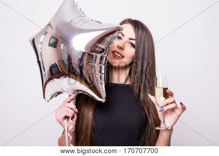 Woman With Star Shaped Balloon Drinking Champagne