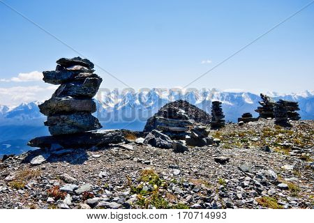 Altai, the North-Chuya ridge - Highlands region of Siberia. A pile of stones composed on the mountain top.