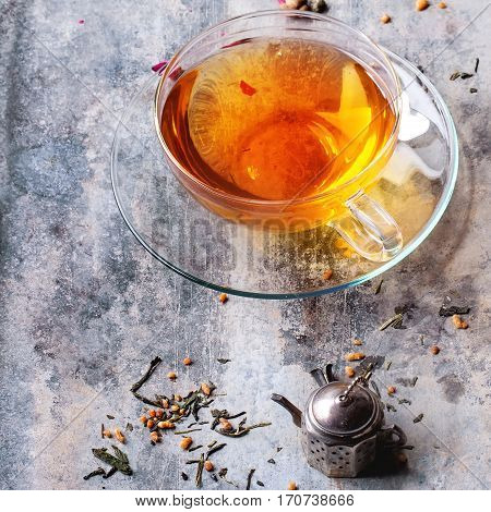 Cup Of Hot Tea With Teastrainer