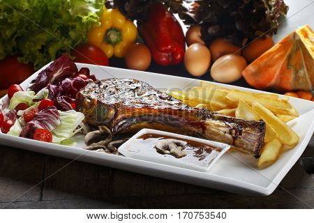 Prime rib with fries and salad