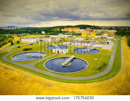 Aerial view of public sewage treatment plant for 165, 000 inhabitants of Pilsen city in Czech Republic, Europe. Environment and industry from above.