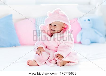 Baby In Bathrobe Or Towel After Bath
