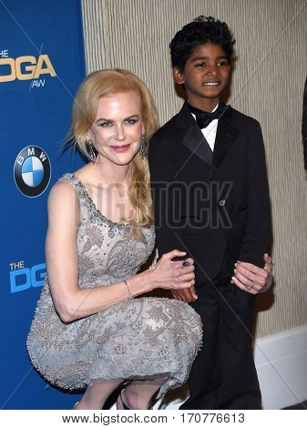 LOS ANGELES - FEB 04:  Nicole Kidman and Sunny Pawar in the press room at the 69th Annual DGA Awards on February 4, 2017 in Beverly Hills, CA                