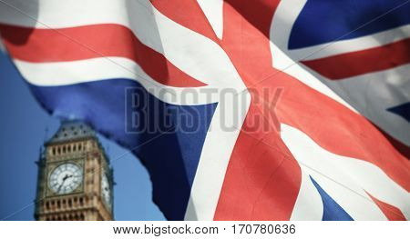 flags of UK and EU combined over icons of London - Brexit concept