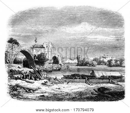 Ruins of Saint Benezet bridge, in Avignon, vintage engraved illustration. Magasin Pittoresque 1846.