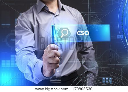 Business, Technology, Internet And Network Concept. Young Businessman Showing A Word In A Virtual Ta