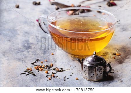 Cup Of Hot Tea With Teastrainer