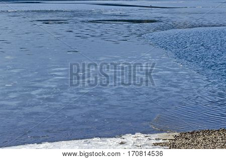 Ice at shore and frozen water in the dam, Pancharevo, Bulgaria