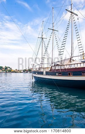 Italy, Ischia, Ischia Porto, a sailing boat in the harbor