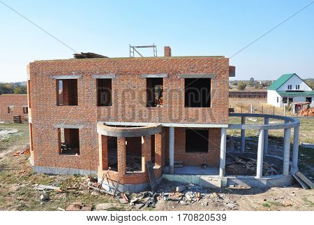 Built residential brick house. House Construction Site.